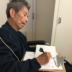 Writing a card for his sister while in hospital 2017
