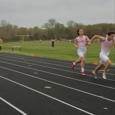 Keegan running in 10th grade track. They won this race. 2021