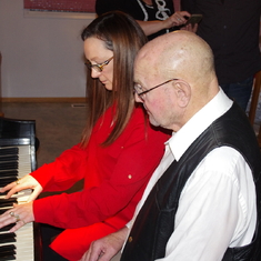 Norton & Debbie chording on the piano