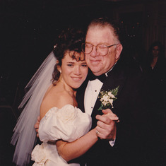 Dad with Dody, daughter #5, on her wedding day.