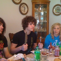 Jake, Zak and Lizzie at my Mom & Dad's house That Fro Tho! Had the same hair when I was his age