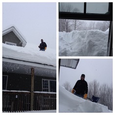 Clearing all the snow from our roof after being away for the Holidays.