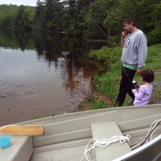 Multitasking...working and fishing with his girls.