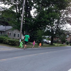 The girls helping daddy train for Ironman.