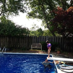 This was taken during the summer of 2014. Jake would be so proud of his girl that she was jumping off the diving board the next summer without any help.