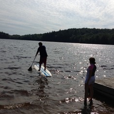 Trying out the Tarolli's paddle board.