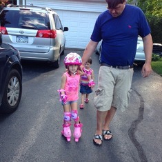 Helping Ava with her new skates.