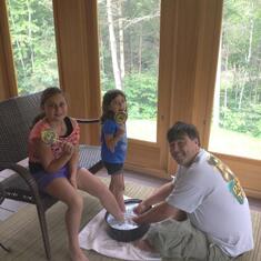 Giving Maddy and Ava pedicures in Lake Placid!
