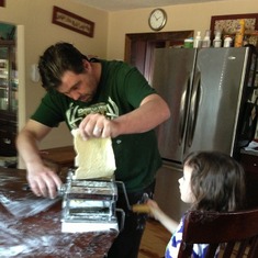 The girls loved making pasta with daddy.