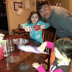 Baking with daddy.
