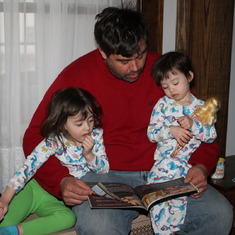Daddy sharing his love of reading.