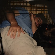 Jake and Chinook in the cage. He loved that dog so much.