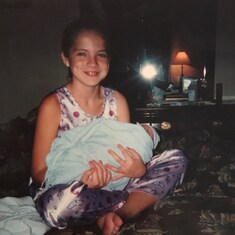 Jade holding her baby brother, Gavin, moments after he was born on October 17, 2002.