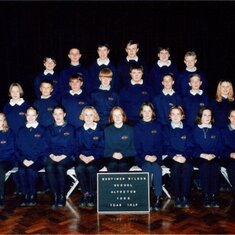 Jade's school photo. Jade is on the bottom row, far right