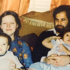 Baba and Mom as young parents -- with Mariam and Hosein.