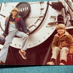 Slaton, TX with cousin Chris at their Great Granddad's train he had engineered at one time.