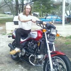 Our dad and his motorcycle !