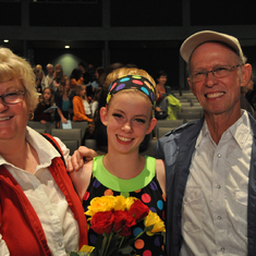 Mom and Dad with Lilly after a dance recital