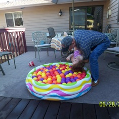 Tossing Jordin into a pool of balls