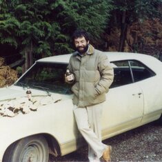 Jimmy leaning on Frank Samuelson's '69 Chevelle and the tree mushrooms they had collected
