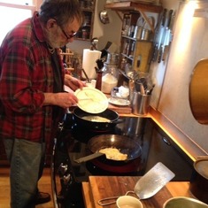 Jimmy cooking breakfast in his kitchen in Ocean Shores
