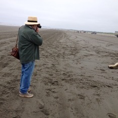 Jimmy photographing on the beach in Ocean Shores