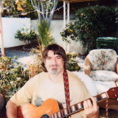 Jim with his Guitar in Oceanside