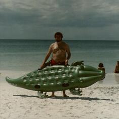 Jim bought an alligator raft to float on in the bay