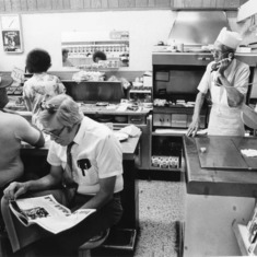 Paul Beal takes an order over the phone at Long's Drug Store in 1985
