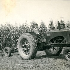 photo taken of Jim on tractor by Mr. J.D. Snyder abt 1948