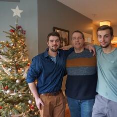 James with his dad and brother Scott at Christmas in Vancouver in 2018.
