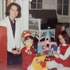 Lynda, Joe, and Rachel on Christmas morning, 1985.