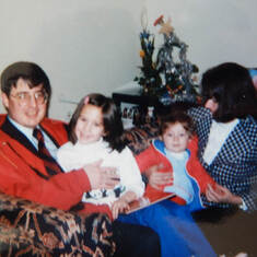 Jimmy, Lynda, Rachel, and Joe at Christmas time, 1986.