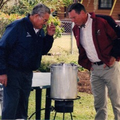 Daddy and nephew, Fred Cope, checking the Fried Turkey at Thanksgiving Lunch 2002
