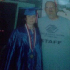 me and grandpa at graduation