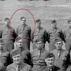 zoom in on Jim Kucera 1943 in Camp Hood Texas