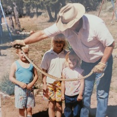 Grandpa with grandkids David, Kristy, and Erinn at Lindreth, NM