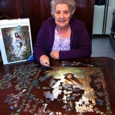 Mom gave Anna this puzzle because it reminded her of Anna when she was a young thing...Anna is assembling it in Mom's honor...thanks for the photo, Anna!