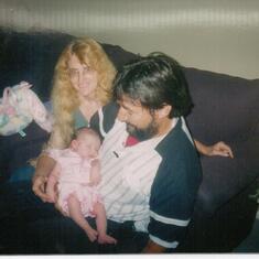 R n J meeting their second grand-baby, Paige Madelyn for the first time in 2003.