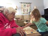 Avalyn shows her great grandmother what a skill she has putting puzzles together.