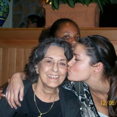 100_3424 Mama loves kisses from her family Here's Christina w/Happy Birthday loving on her beautiful Grandma Janet Trinci adoring every moment look @her glow! Muah!xoxox :')) Miyah in back! Great'Grand Daughter from Tiffanie!