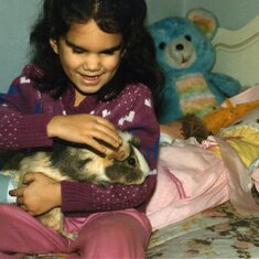 Jan holding her pet Guinea Pig, Daisy - March 1986