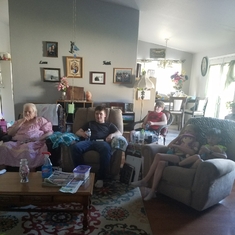 Grandma watching shows with the great grandkids 