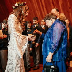 Taking communion at Drew & Katelyn's wedding (November 2018)