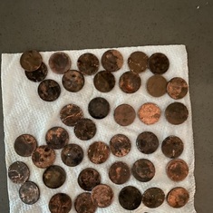 I found 39 pennies in a circle and one dime walking home- Thank you my son!