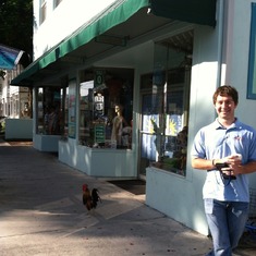 Jared in Key West trying to sneak up to a rooster - July 2013.
