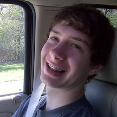 April, 2010 - Jared sarcastically rolling his eyes & smiling and showing off his new braces