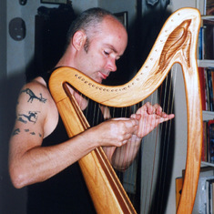 Jay playing the harp on one of our visits to Toronto in the 90's, a wonderful musician!