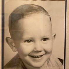 At five years old, when his mother got him all dressed for this photo, he said "Ain't my cute"