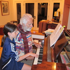 Jay with older Julia at piano